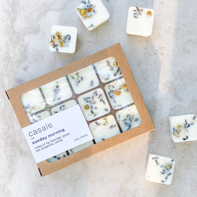 12 SUNDAY MORNING BOTANICAL SOY WAX MELTS with botanical pieces in a brown box, helping families thrive with calm support