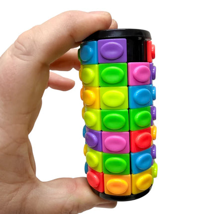 Hand holding colorful cylindrical puzzle toy designed for tactile play Slide & Rotate Puzzle - Twin Pack
