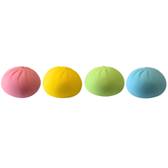 Squeeze Bun - 9cm colourful sensory squishy fidget toy in pink yellow green and blue