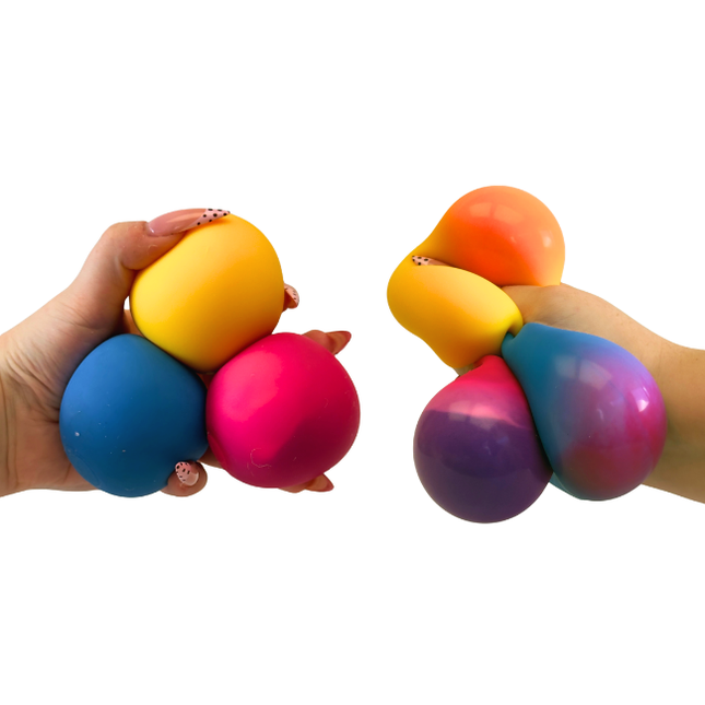 Hands squeezing clusters of colorful round sensory balls in blue, yellow, pink, orange and purple