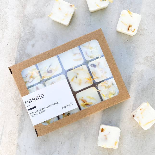 12 UBUD BOTANICAL SOY WAX MELTS with floral elements in cardboard packaging, helping families thrive with tools to calm connect support