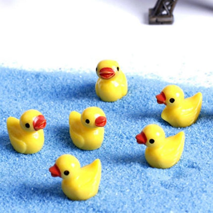 Six small yellow rubber ducks on textured blue surface for Mastermind Game Fun Brain Puzzle Game helping families thrive with tools to calm connect and support