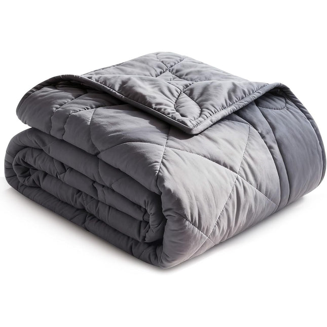 Folded gray weighted blanket on a white background
