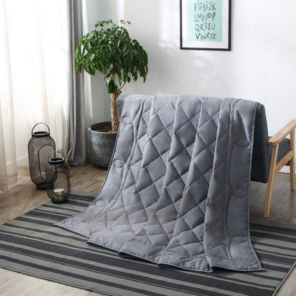 Weighted Blanket (15lbs, 60''x80''), Heavy Blanket Washable for Adult with Premium Glass Beads-Grey draped on chair indoors.