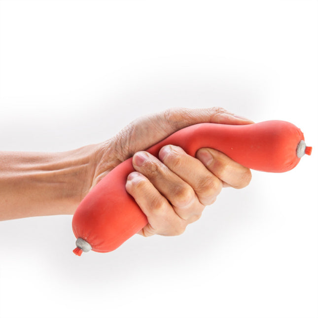 Stress Relief Sausage red sensory fidget toy being squeezed by hand