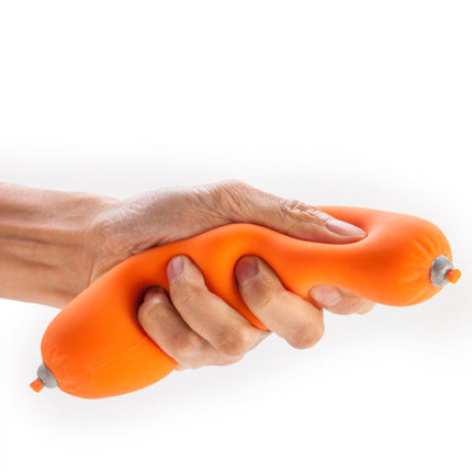 Stress Relief Sausage orange squishy fidget toy held in hands