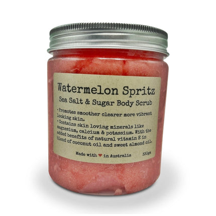 Watermelon Spritz Body Scrub Sea Salt Sugar & Coconut Oil with Vitamin E in clear jar promoting vibrant skin care.