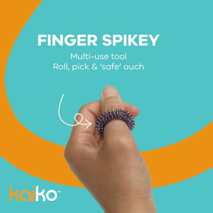 The Works Fidget Kit featuring a hand holding a purple finger spikey sensory tool on a blue and orange background