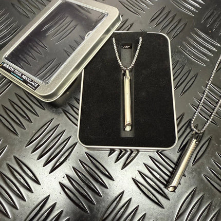 Breath Tool 304 grade Stainless Steel IN WINDOW TIN - Mindful Breathing Unisex Necklace with chain on black surface.