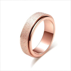 Frosted Rose Gold Anxiety Fidget Ring Spinner with textured grip, designed to calm and support sensory needs.
