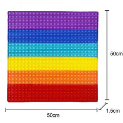 Bubbles Jumbo 50cm Poppers sensory fidget toy with colorful rows, helping families thrive with tools to calm connect and support.