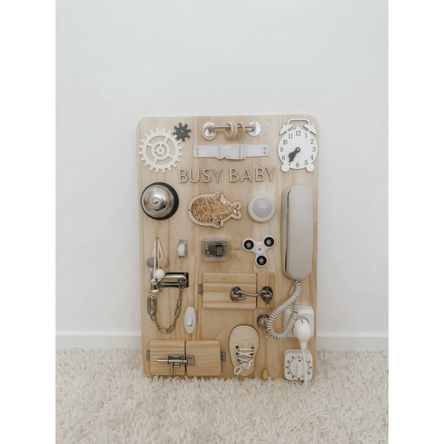 Busy Board + wooden sensory toy with locks, gears, phone, and fidget spinner helping families thrive with tools to calm, connect and support