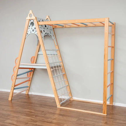 Wooden Teepee Playground indoor play structure with climbing ropes and monkey bars for sensory and physical activity.