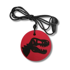 Dino Pendant sensory chew necklace in red with black dinosaur design, helping families thrive with calm and support.