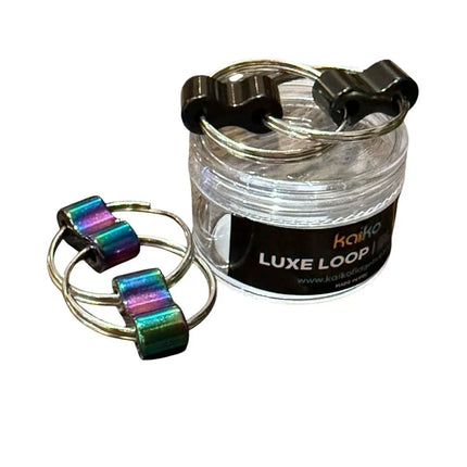 Luxe Loop sensory fidget rings with metallic beads, designed to aid focus and stress relief for all ages.