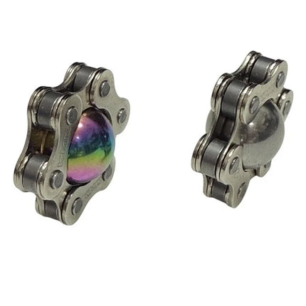 Magic Ball Fidget by Kaiko featuring metallic chain design with iridescent and silver sensory central spheres.