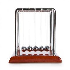 Newton's Cradle with Wood-look Base showing metal balls suspended on strings in a polished frame.