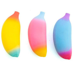Three colorful soft sensory toys shaped like bananas in yellow, pink, and blue titled Stretch Banana
