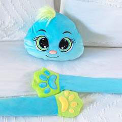 Melliboo Sleeping Buddy Boo plush with large eyes and soft blue arms ending in green paw prints on white bedding