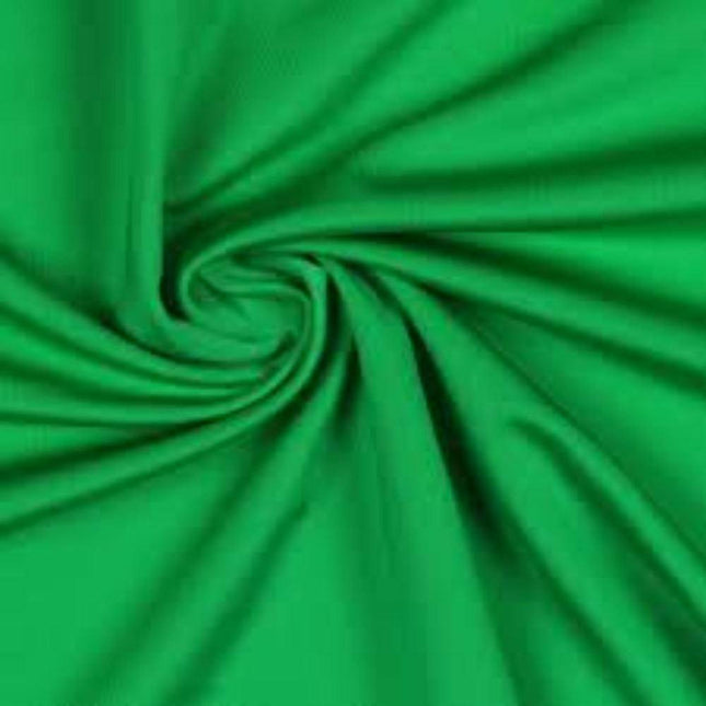 Soft green Lycra Bed Sheets gently stretched to show smooth, stretchy texture helping families thrive with tools to calm, connect and support