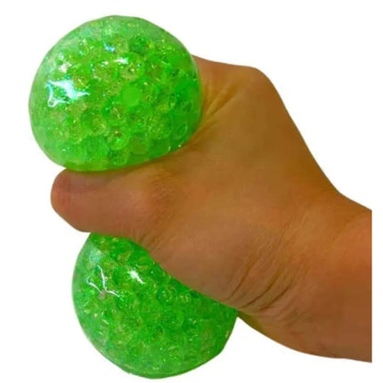Hand squeezing bright green Squishy Water Orbs Ball W/Neon Glitter - 7cm sensory fidget toy with textured beads inside.