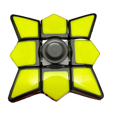 Yellow & White Cube Spinner with bright yellow panels and central black spinner for sensory play and focus.