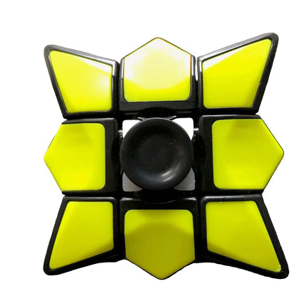 Yellow & White Cube Spinner with bright yellow segments and a central black spinning button for sensory play.