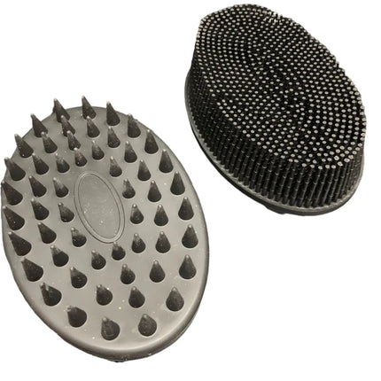 Black Tactile Sensory Brush with varied textured bristles for sensory stimulation and fidget use, black oval design.