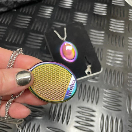 Groove Stone - Dual Support Necklace & Key Chain held with metallic rainbow finish designed for sensory fidgeting and support.