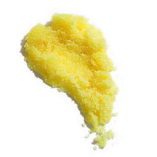 Yellow textured scoop of Pineapple Papaya with Vitamin E Body Scrub helping families thrive with tools to calm, connect and support